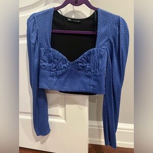 Zara blue polka dot top. Very flattering and pretty.